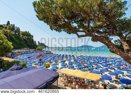 Lerici, Italy - July 16, 2022: Lerici Beach With Many Umbrellas, Tourist Resort On The Coast Of The 