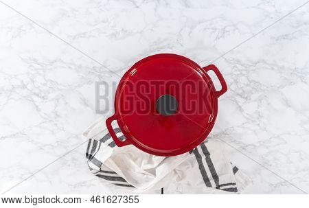 Flat Lay. Cooking Chicken Noodle Soup With Kluski Noodles In An Enameled Dutch Oven.