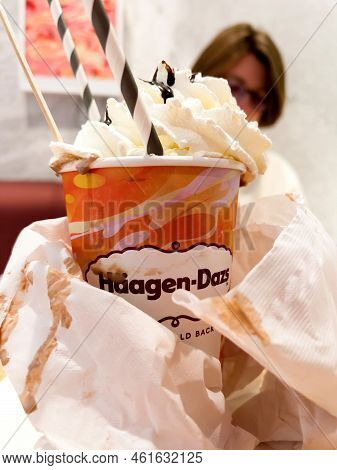 Paris, France - Sep 10, 2022: Close-up Of Delicious Milkshake With Female In Background - Haagen-daz