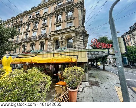 Geneva, Switzerland - September 15 2021: An Elegant French Restaurant With Sign And Outdoor Seating 
