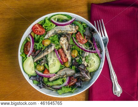 Healthy Salad   Top Withb Sardines , Olives And Cucumbers