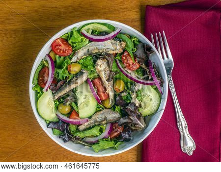 Healthy Salad   Top Withb Sardines , Olives And Cucumbers