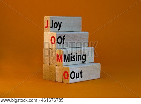 Jomo Joy Of Missing Out Symbol. Concept Words Jomo Joy Of Missing Out On Wooden Blocks On Beautiful 