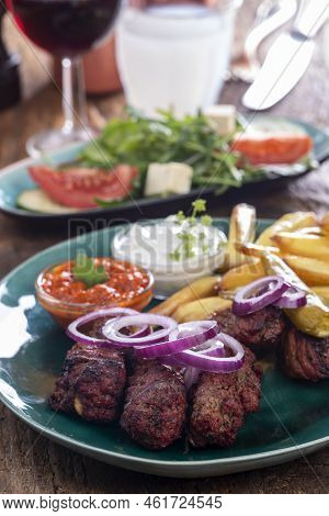 Overview Of Greek Bifteki With French Fries