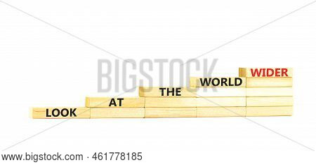 Look At The World Wider Symbol. Concept Words Look At The World Wider On Wooden Blocks On A Beautifu