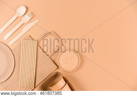 Ecology Tableware - Paper Food Packaging Over Light Brown Background With Copy Space. Street Food Pa