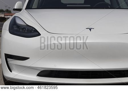 Tesla Ev Electric Vehicles On Display. Tesla Products Include Electric Cars, Battery Energy Storage