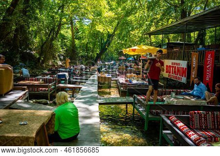 Ulupinar, Turkey - September 9, 2022: Tropic Restaurants On The River. Places On The River With Tour