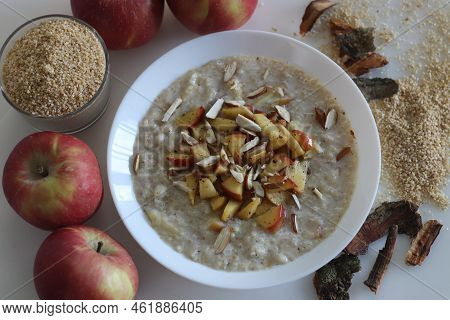 Broken Wheat Or Dalia Porridge. Porridge For Breakfast Made With Broken Wheat And Milk, Served With