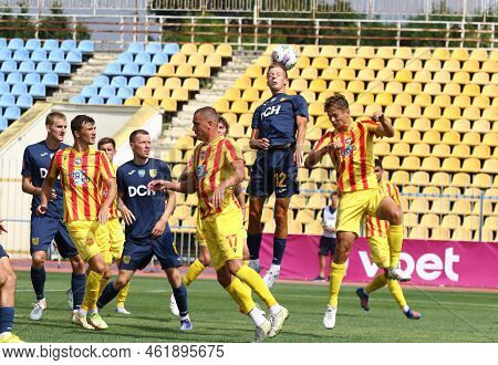 Uzhhorod, Ukraine - August 29, 2022: Metalist Kharkiv (blue) And Inhulets (yellow) Players In Action