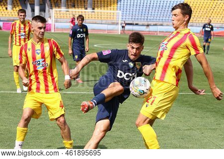 Uzhhorod, Ukraine - August 29, 2022: Maksym Priadun Of Metalist Kharkiv (l) Fights For A Ball With T