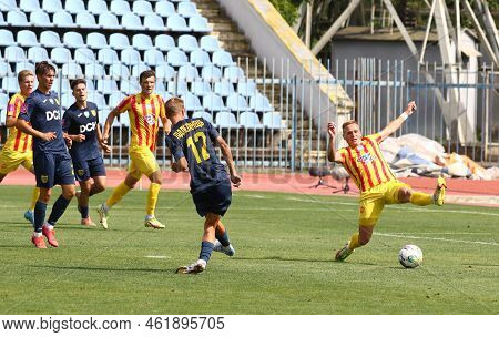 Uzhhorod, Ukraine - August 29, 2022: Yevhen Pidlepenets Of Metalist Kharkiv (#12) Kicks A Ball Durin