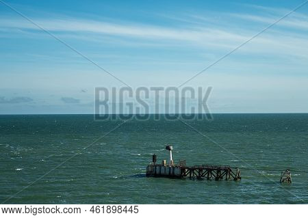 Europe, France, Dunkerque - July 9, 2022: East Side Light Beacon At End Of Pier Named Jetee De Dunke
