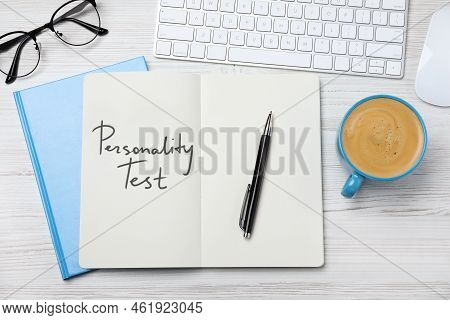Notebook With Text Personality Test, Computer Keyboard And Cup Of Coffee On White Wooden Desk, Flat 