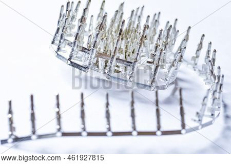 Line Of New Silver Tinned External Pcb Angular Connectors Placed On White Background.
