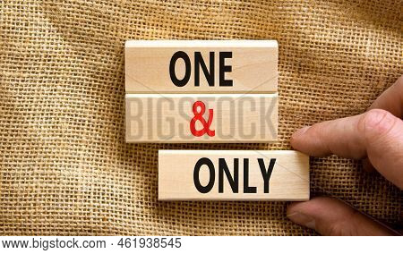 One And Only Symbol. Concept Words One And Only On Wooden Blocks On A Beautiful Canvas Table Canvas 