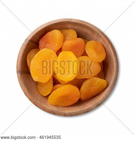 Dried Apricots In A Bowl Isolated Over White Background.