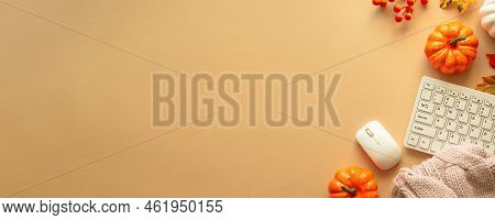 Autumn Office Workspace. Keyboard, Laptop, Notebok With Autumn Clothes And Fall Decorations - Pumpki