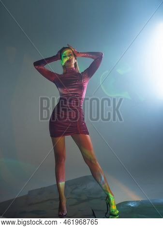 Glamorous Portrait Of A Young Beautiful Blonde In A Stylish Scarlet Short Dress, Stylish Shooting Wi
