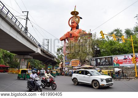 New Delhi, India - June 21, 2022 - Big Statue Of Lord Hanuman Near The Delhi Metro Bridge Situated N
