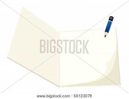 A Pencil Lying On A Blank Sketchbook