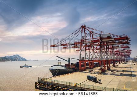 A Row Of Crane In The Harbour