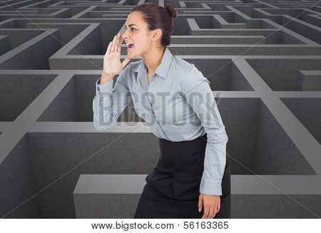 Businesswoman shouting against difficult maze puzzle