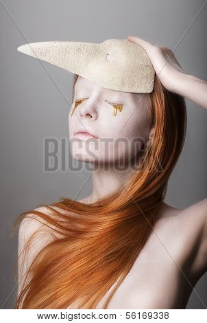 Fantasy. Stylized Woman With Golden Teardrops Holding Carnival Mask