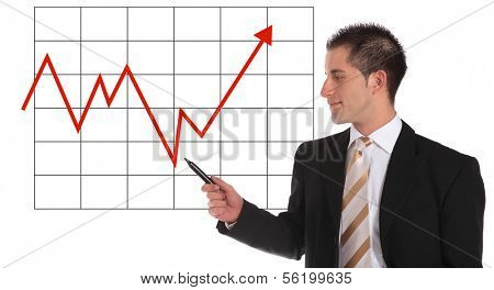 A handsome businessman presenting an annual balance report. All on white background.