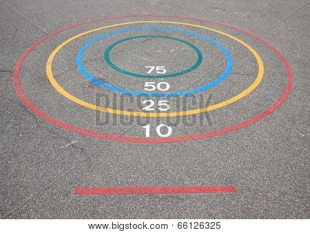 Quoits Game With Winning Circles And Baseline On Asphalt