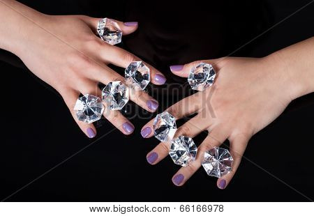 Close-up Of Woman's Hand And Diamonds