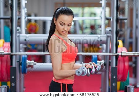 Sport woman exercising gym, fitness center