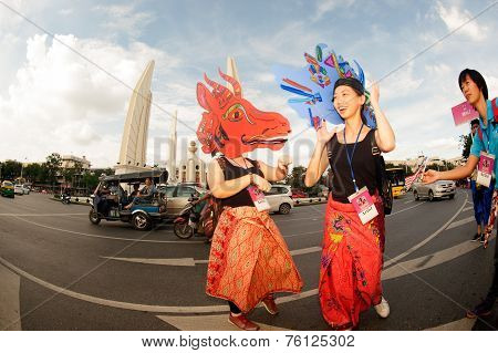 Actors Holding Puppets In Harmony World Puppet Carnival In Bangkok,Thailand 2014 Parade.