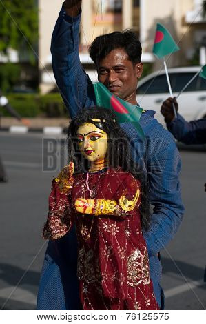 Actors Holding Puppets In Harmony World Puppet Carnival In Bangkok,Thailand 2014 Parade.