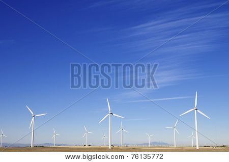 group of windmills for electric power generation alternative in Cuarte de Huerva, Saragossa, Aragon, Spain