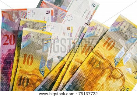Circulated Swiss Francs Currency On White