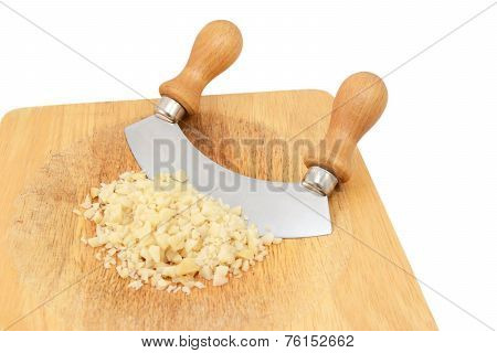 Finely Chopped Macadamia Nuts With A Rocking Knife