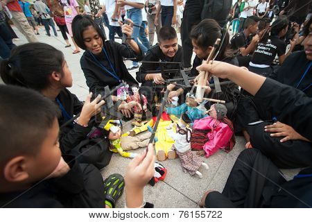 Actors Holding Puppets In Harmony World Puppet Carnival In Bangkok,thailand 2014 Parade.