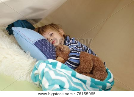 Child Taking A Nap, Resting In A Play Tent