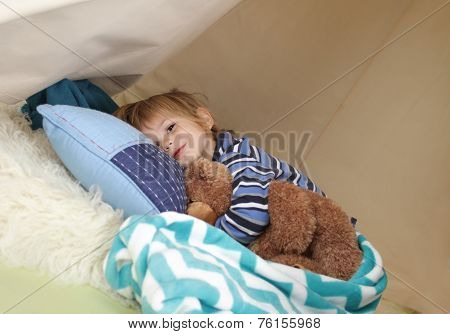 Child Taking A Nap, Resting In A Play Tent
