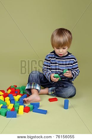 Child Playing With Blocks