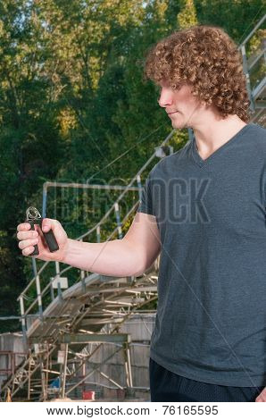 Man With Hand Grip Exerciser