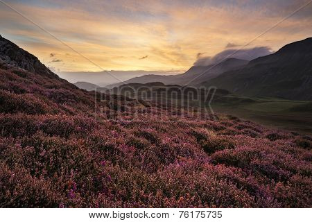 Stunning Summer Dawn Over Mountain Range With Lake And Beautiful Sky