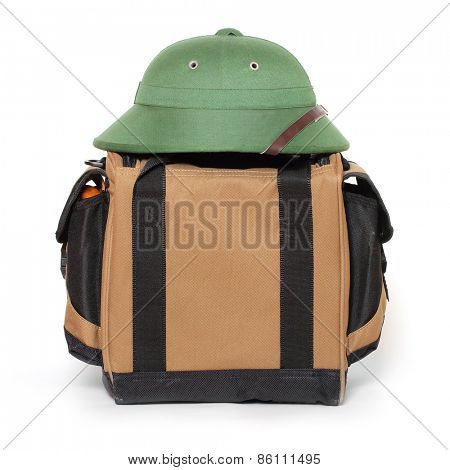 Retro travel bag and tropical hat.