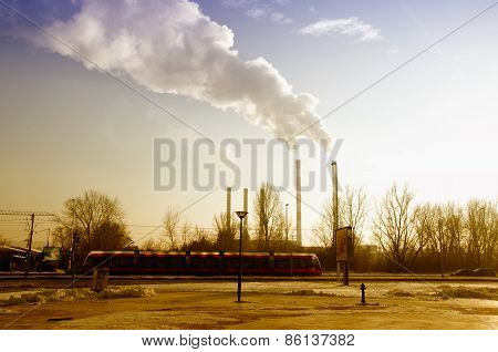 Chimney, Smoke And A Tram.