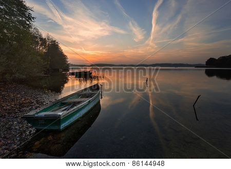 Sunset Lake With Fisherman Boat Landscape.
