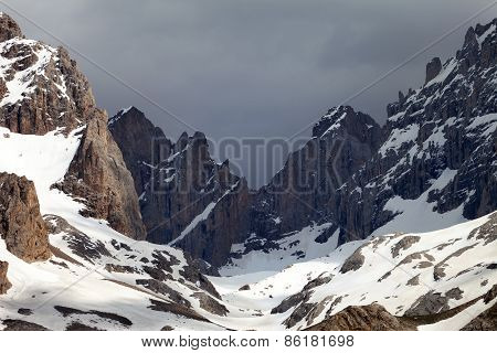 Snowy Mountains And Storm Clouds