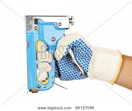 Staple gun in male hand isolated on white