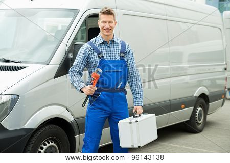 Worker With Work Tool And Toolbox