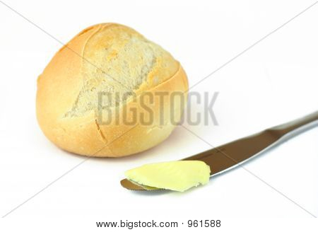Bröd och smör isolerad på vit